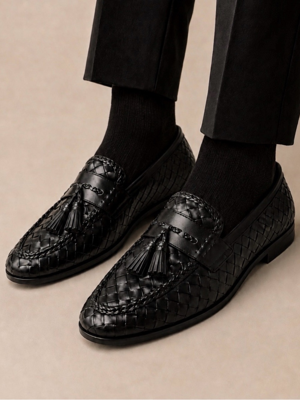 Cole Haan Black Woven Leather Tassel Loafers
Never Worn.